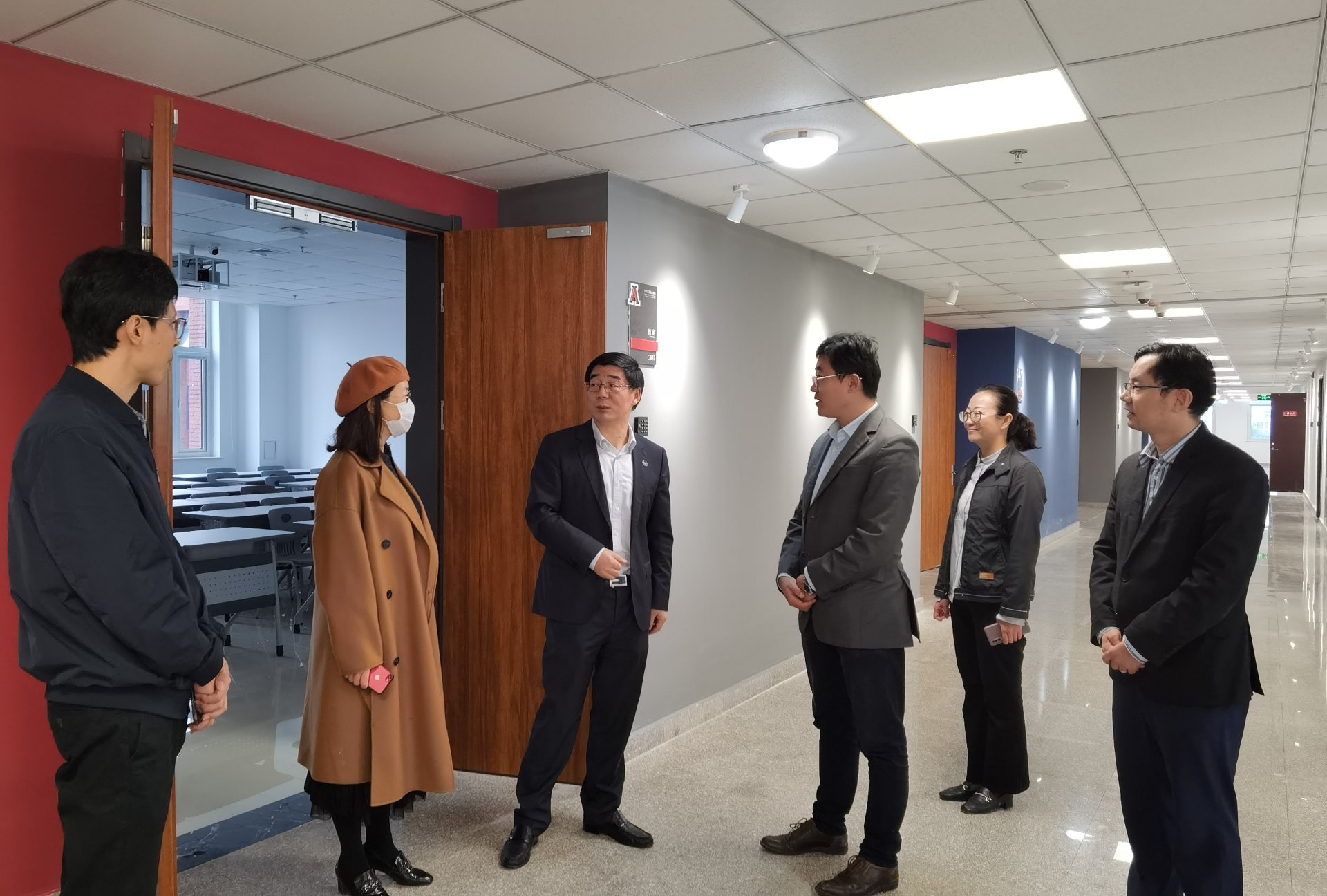 校长韩旭莅临emc全站注册就送调研指